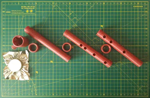 Parts of the wide version laid out with a sheet of foil