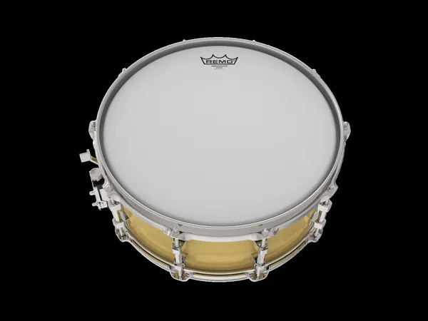 A coated drum head on a brass snare drum