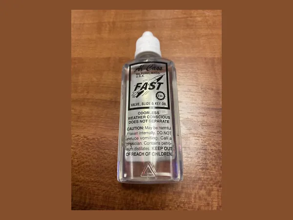 A small bottle of trumpet valve oil